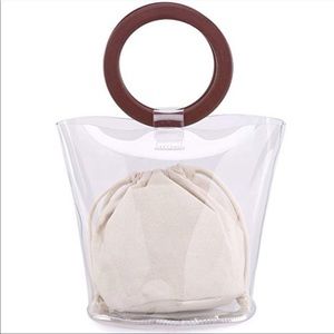 Clear bag with wooden handles